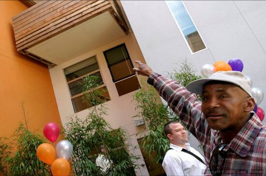 Residents Celebrating at the Folsom Dore Apartments Grand Opening. San Francisco, California. (Photo courtesy CHC)