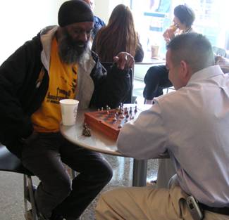 Residents Playing Chess at Folsom Dore Apartments. San Francisco, California. (Photo courtesy CHC)