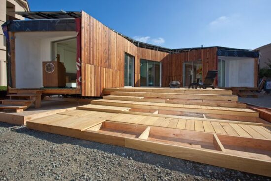 Team California Refract House for 2009 Solar Decathlon: Central Courtyard Anchored by Building Ends which Still Need to be Completed. (Photo by Oliver Shay)
