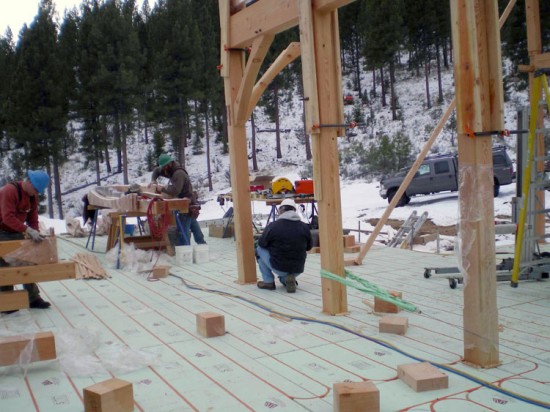 Installation of Water Tubing in Warmboard Radiant Panels. (Photo courtesy Warmboard)