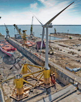 The WindFloat prototype in preparation for its tow offshore.  Photo taken from the top of the Lisnave gantry crane.  (Photo courtesy Principle Power Inc.)