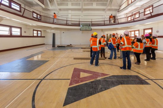 The original gymnasium along with its hardwood flooring for the basketball court is retained and refurbished for the residents at Kelly Cullen Community. (Photo by Oliver Shay)