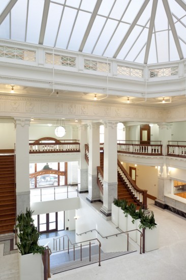 Kelly Cullen Community’s two-story lobby is filled with natural daylight coming in from the main building facade as well as the skylight. (Photo by Mark Luthringer)