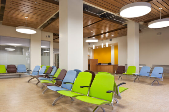 The reception lobby at the LEED CI Gold-certified Tom Waddell Urban Health Clinic in San Francisco is a modern and space-conscious room accented with cheerful colors. (Photo by Mark Luthringer)
