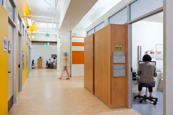 The Tom Waddell Urban Health Clinic’s exam rooms and hallways are finished with low-emitting interior finishes including flooring, paint, and low-mercury lamps. (Photo by Mark Luthringer)