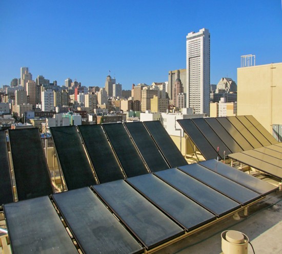 The solar thermal system on the rooftop of the Kelly Cullen Community in San Francisco pre-heats the building’s hot water system and helps minimize the use and operation cost of gas. (Photo courtesy Gelfand Partners Architects)