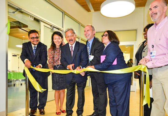 San Francisco Mayor Ed Lee, Director of Primary Care Homeless Services for the San Francisco Department of Public Health and the Clinic’s Medical Director Dr. Joseph Pace, and other community members marked the grand opening of the Tom Waddell Urban Health Clinic at a ribbon cutting ceremony in the fall of 2013. (Photo courtesy Mayor Ed Lee)